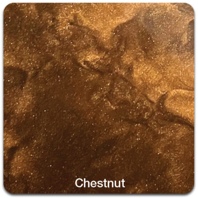 A close-up of a brown, swirled chestnut-colored surface with a glossy finish.