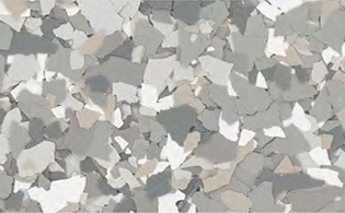 Gray, beige, and white terrazzo floor pattern with irregularly shaped speckled fragments.