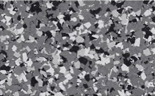 Gray, black, and white speckled terrazzo floor pattern with irregularly shaped fragments scattered throughout.
